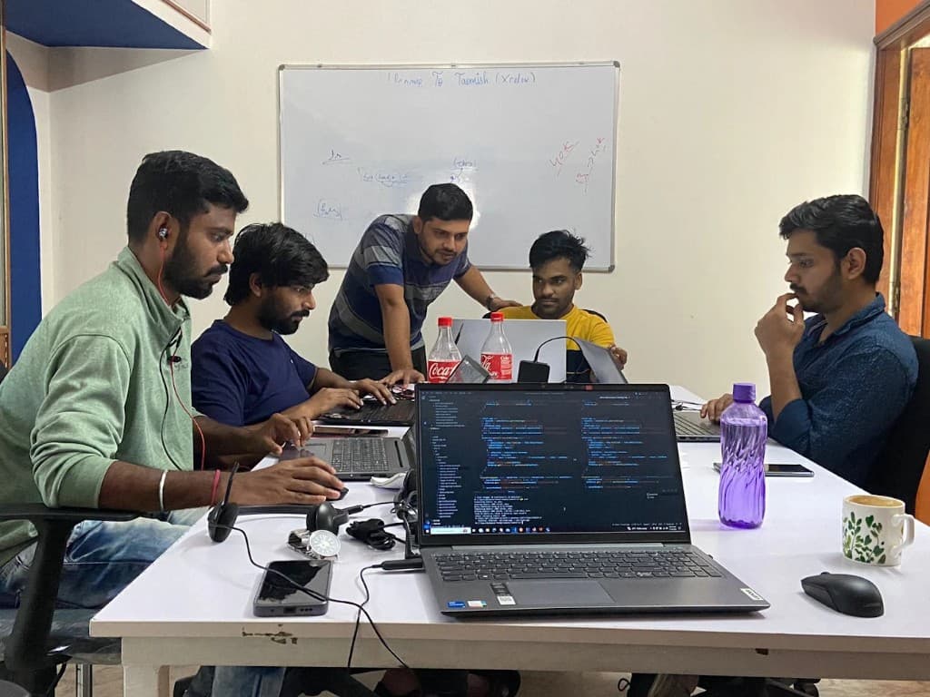 Engineers collaborating around a conference table